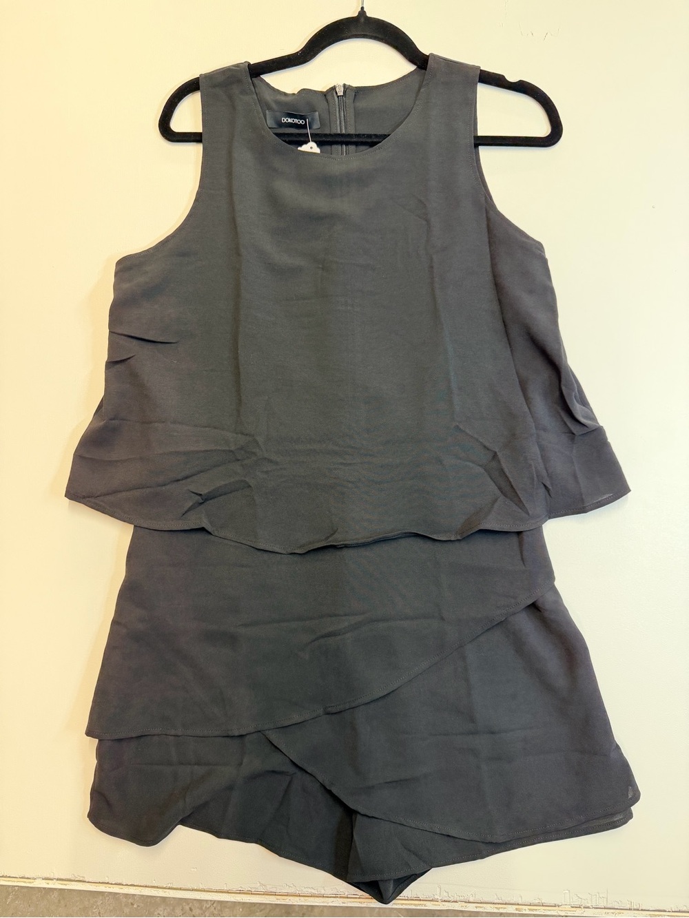 W125 Sleeveless Layered Black Romper by Dokotoo